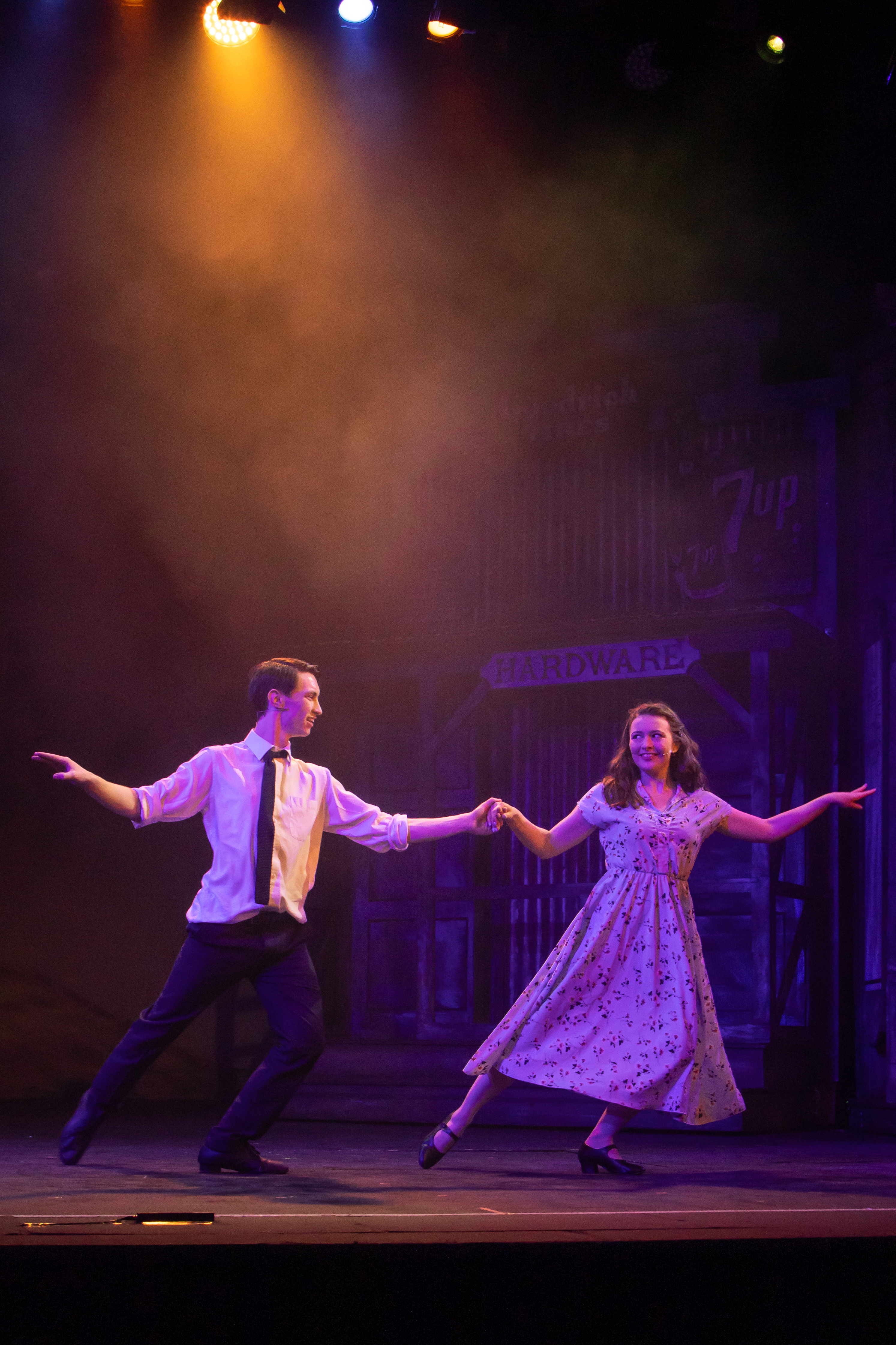 A promotional image from the show Crazy For You featuring the two main characters dancing on the stage.